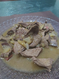 Una foto de Hígado encebollado