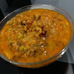 A picture of Chicken Mince Curry with Green Peas and Potatoes.