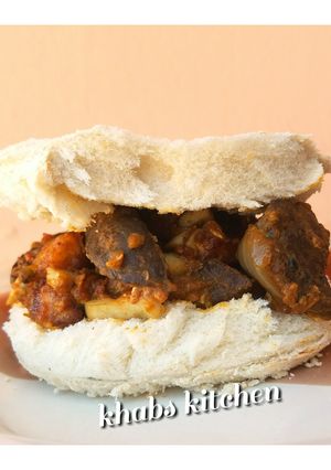 A picture of Plantain and liver sauce sandwich.