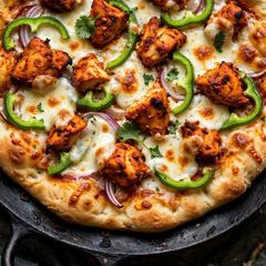 A picture of *Title: Tawa Chicken Tikka Pizza - Without Oven.