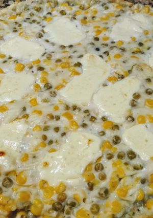 Una foto de Tarta fácil de arveja y choclo