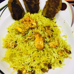 A picture of Egg fried rice with shami kababs !!.
