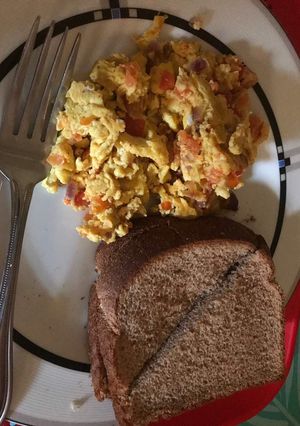 A picture of Fried Scramble and wheat bread.