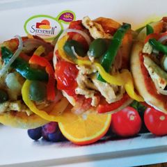 A picture of Home madeVeg mini pizza.