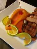 Cerdo confitado con puré de camote a la naranja