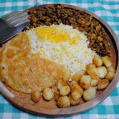 A picture of Ground beef Gheymeh with barberries (khoresh Gheymeh BA Zereshk).