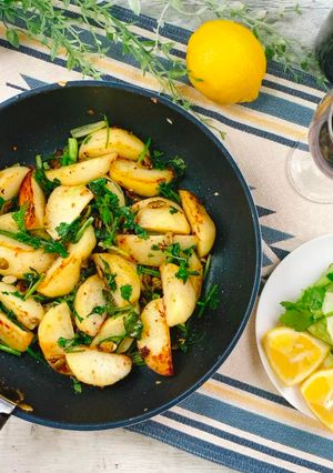 A picture of Umami Taste Potatoes with Shiitake Powder and Lots of Cilantro.