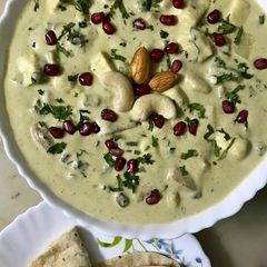 A picture of Navratna coconut kurma.