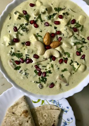 A picture of Navratna coconut kurma.