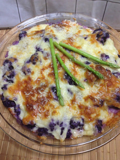Una foto de Coliflor (roja) gratinada com bechamel