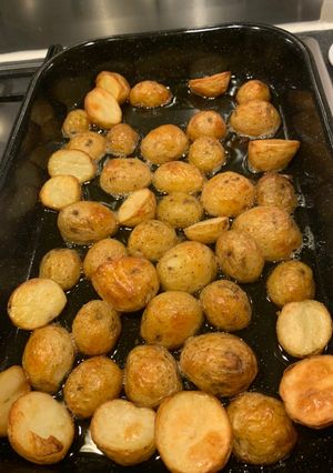 A picture of Roast potatoes in ghee (clarified butter).