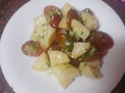 Una foto de tomates cherry fritos