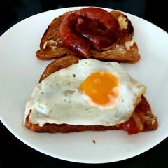 My Cumberland Sausage, Streaky Crisp Bacon & Fried Egg 😉 A picture of My Cumberland Sausage, Streaky Crisp Bacon & Fried Egg 😉.