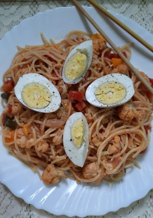 A picture of Egg Noodles with Tomato sauce.