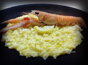 Foto di Risotto con succo di clementine, scampi e limone caramellato