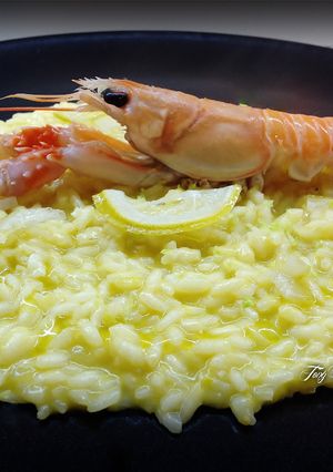 Foto di Risotto con succo di clementine, scampi e limone caramellato