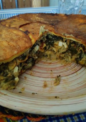 Una foto de Tarta de panqueques con acelga 🥬y lomitos de atún 🐟
