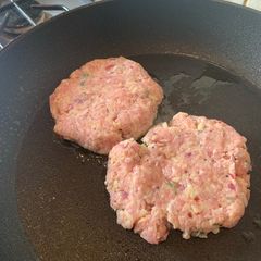 A picture of The best Pork and Apple Burgers.