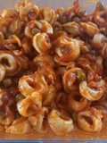 296. Tortellinis de carne con guisantes y bacon