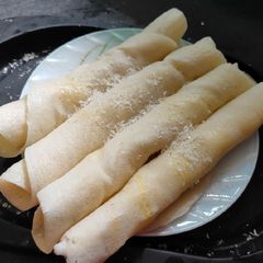 A picture of Sweet dosa rolls.