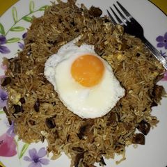 A picture of Mushroom rice with eggs two ways.