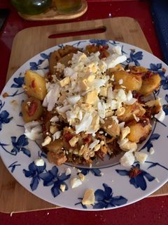 Una foto de Patatas con huevo variados