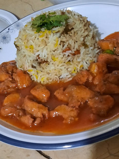 A picture of Chicken Manchurian with fried rice😋😋😋.
