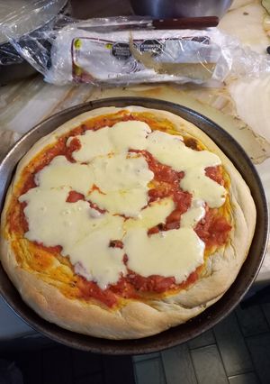 Una foto de Hacer pizza casera