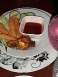 Panko crumbed prawns and sticky drummy