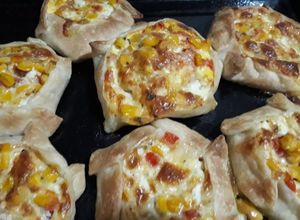 Una foto de Canastitas de choclo y queso