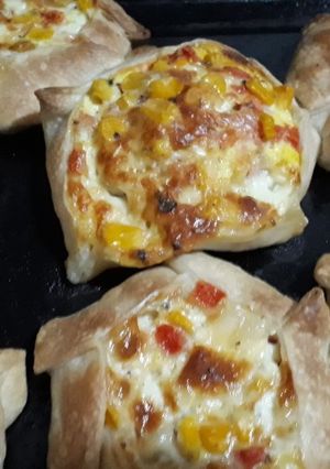 Una foto de Canastitas de choclo y queso