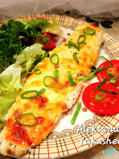 A picture of Sea bream in sour cream garlic sauce.