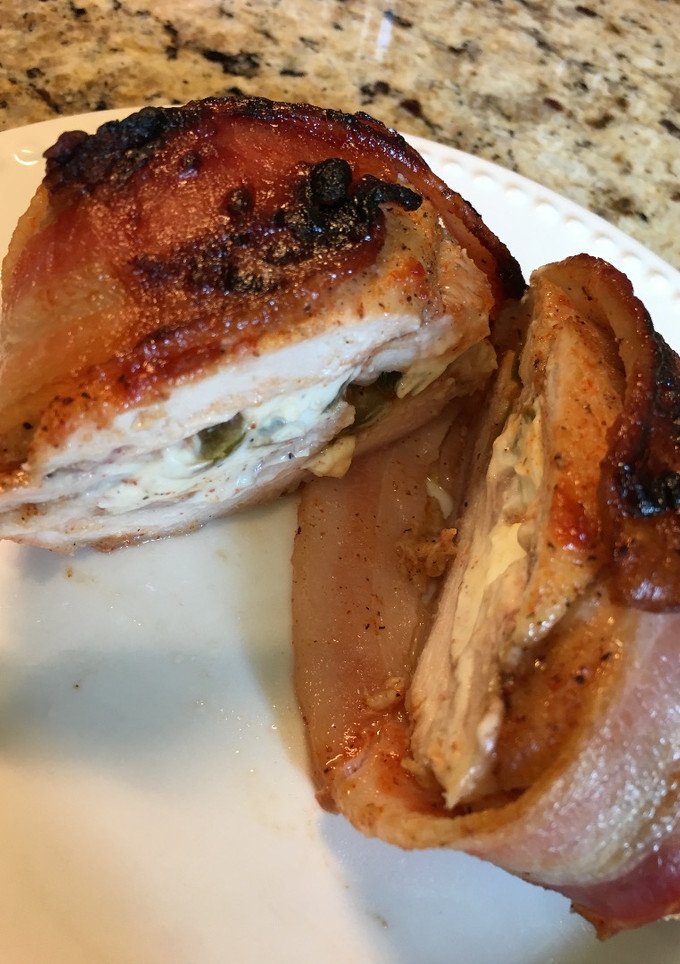 A picture of Chicken Wrapped with Bacon Stuffed with Cream Cheese and Jalapeño.