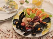 Una foto di insalata di cozze