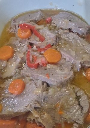 Una foto de Peceto en escabeche cebolla y zanahorias