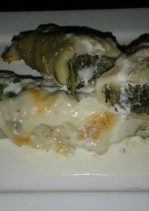 Una foto de Canelones de espinaca 🍃