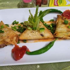A picture of Chicken cheese Samosa🔺.