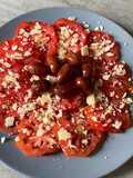 Carpaccio de tomate con cosas