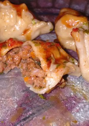 Una foto de Ravioles chinos al vapor, giozas o empanadas chinas