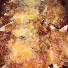 A picture of Red enchiladas.