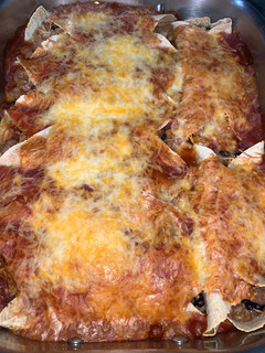 A picture of Red enchiladas.