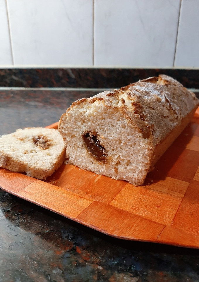 Una foto de Budín de coco y dulce de leche