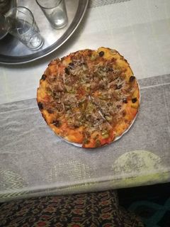 Una foto de Pizza Vegetal