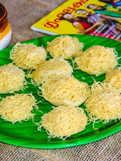 A picture of Cholam Idiyappam (Nool Puttu) / Kerala Style Corn String Hoppers.