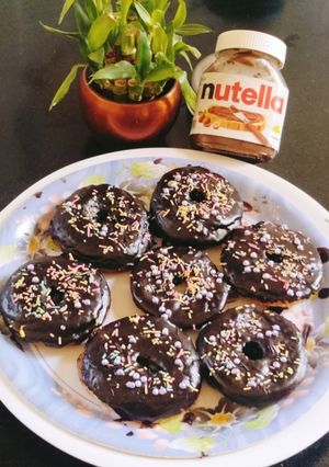 A picture of Chocolate Donuts 😋 🍩🍩🍩🍩.