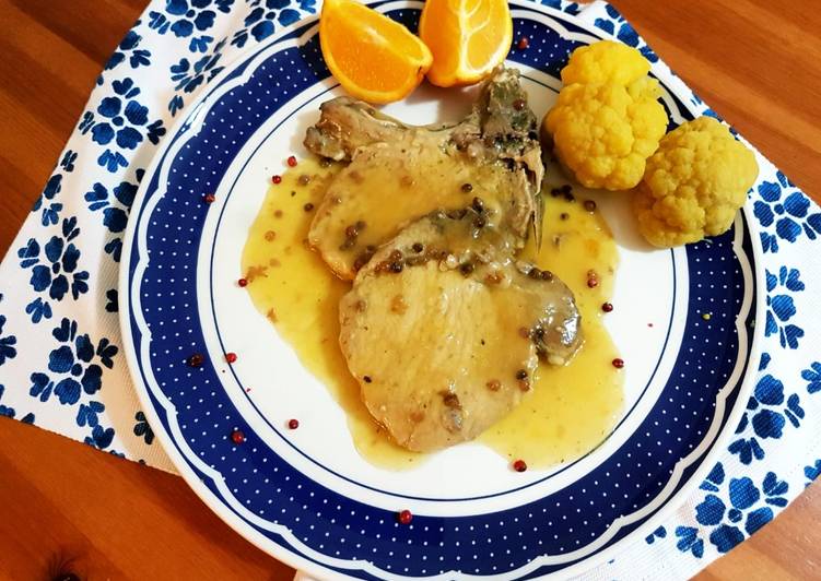 Braciole di maiale all’arancia e pepe rosa