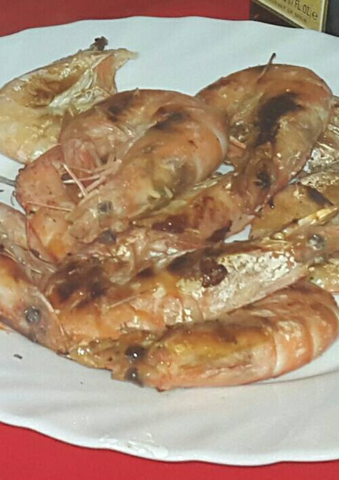 Una foto de Langostinos al whisky