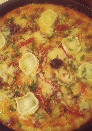 Une photo de Pizza thon,chèvre
