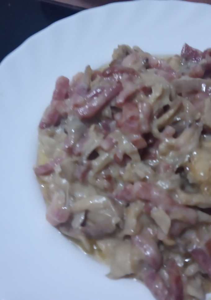 Una foto de Revuelto de setas bacon y queso