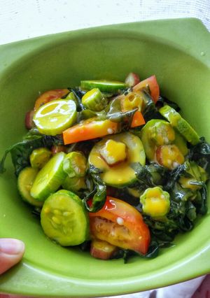 A picture of Seaweed Cucumber Tomato and Okra Salad with Mustard Dressing.